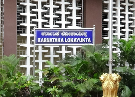 Karnataka Lokayukta raids multiple officials, recovers cash, gold & 80 liquor bottles Karnataka Lokayukta raids multiple officials, recovers cash, gold & 80 liquor bottles
