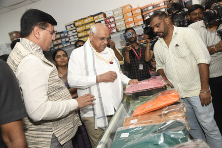 On Gandhi Jayanti, Gujarat CM purchases Khadi, promotes digital payments
