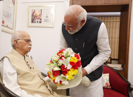 On the day marking his 25 years at the helm, PM Modi calls on L.K. Advani
