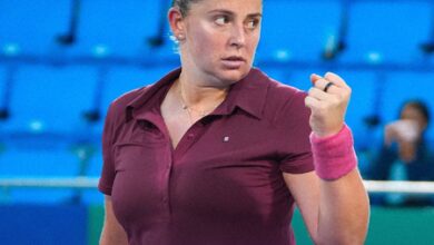Ostapenko saves two set points to beat Shnaider, sails into Wuhan SFs